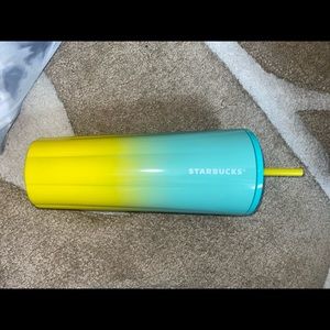 Blue and yellow Starbucks cup